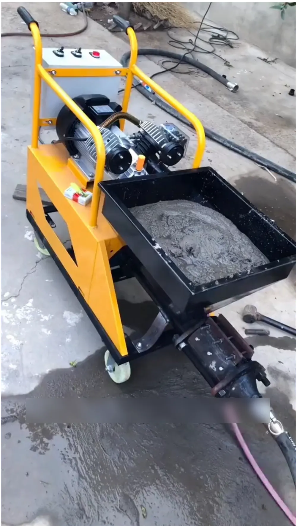 Mortar spraying machine operating in Vietnam