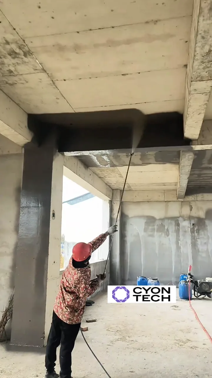 Worker spraying columns and beams with a CYON TECH putty sprayer